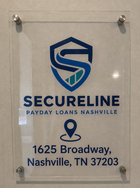 Acrylic wall sign reading Secureline Payday Loans Nashville above the address 1625 Broadway, Nashville, TN 37203